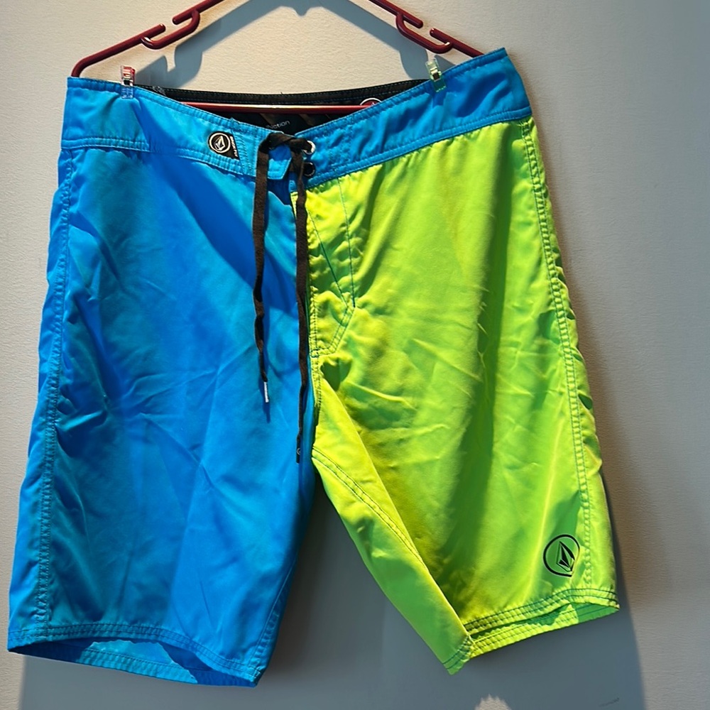 Volcom Blue and Green Athletic Shorts with Eye-Catching Design